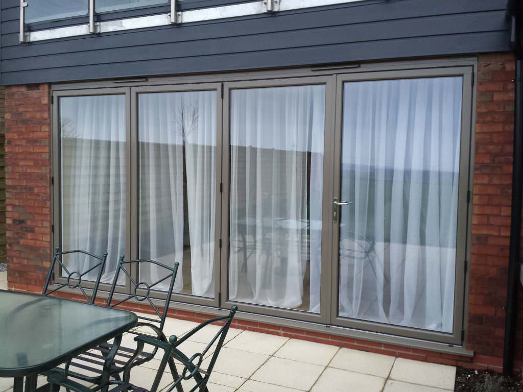 closed grey Aluminium Bi-Fold Doors